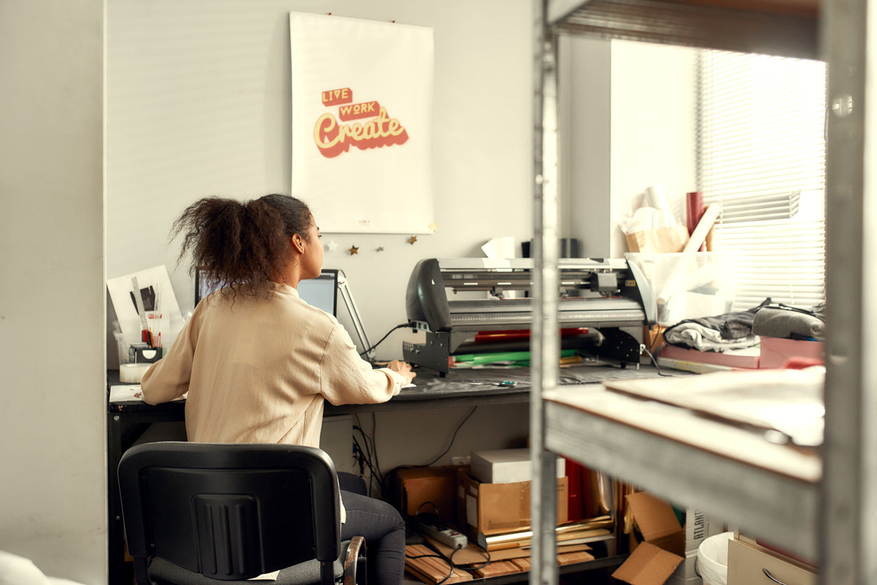 woman using DTG printer